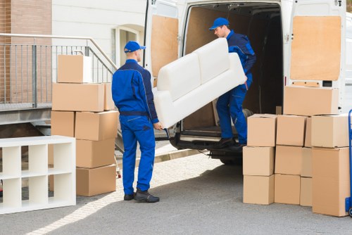 Local team moving furniture into storage near Kentishtown
