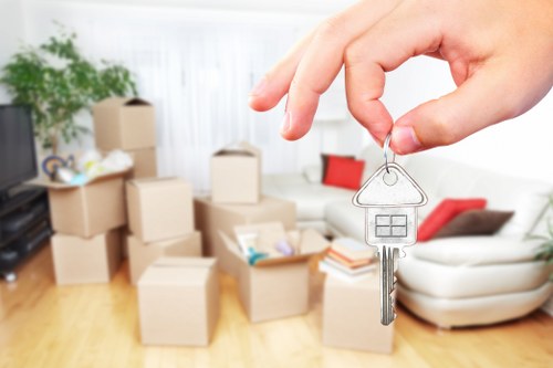 Family packing household items into a mobile storage container